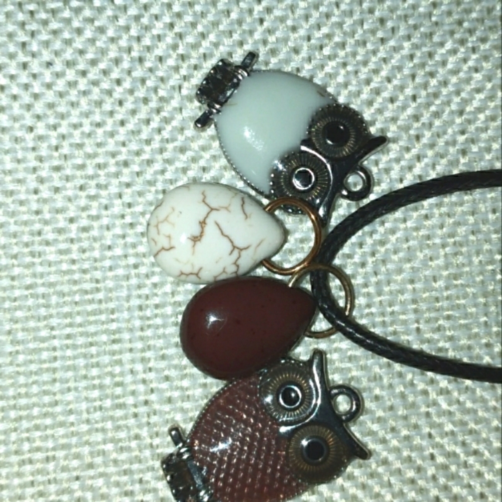 Pretty 2 moons and 2 owls necklace.